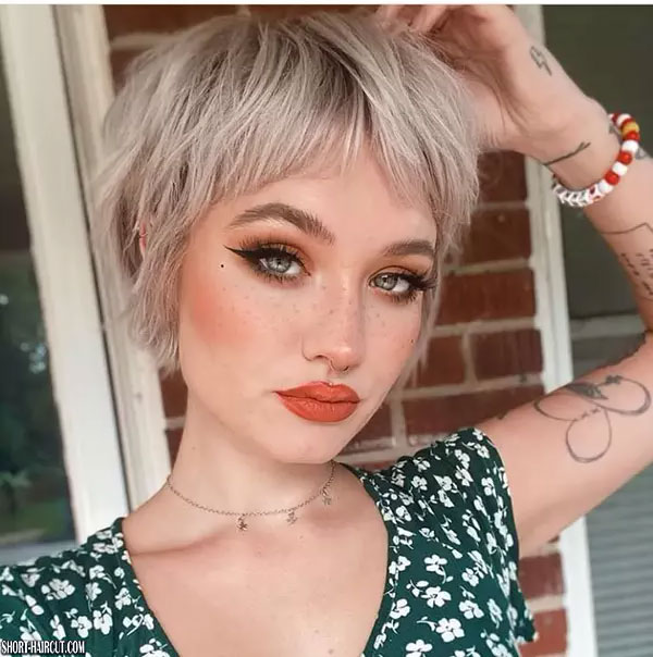 Blonde Pixie Cut With Bangs